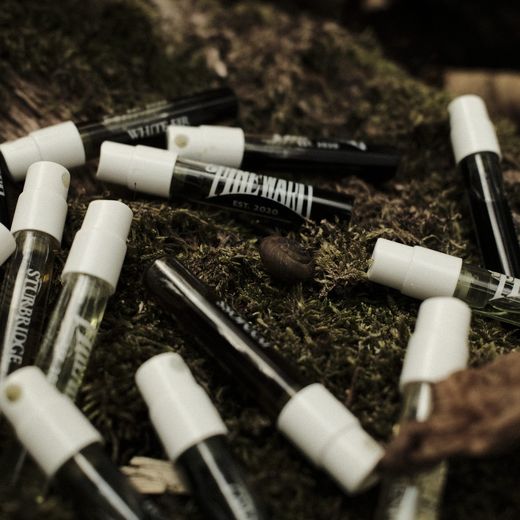 Pineward sample vials scattered on moss